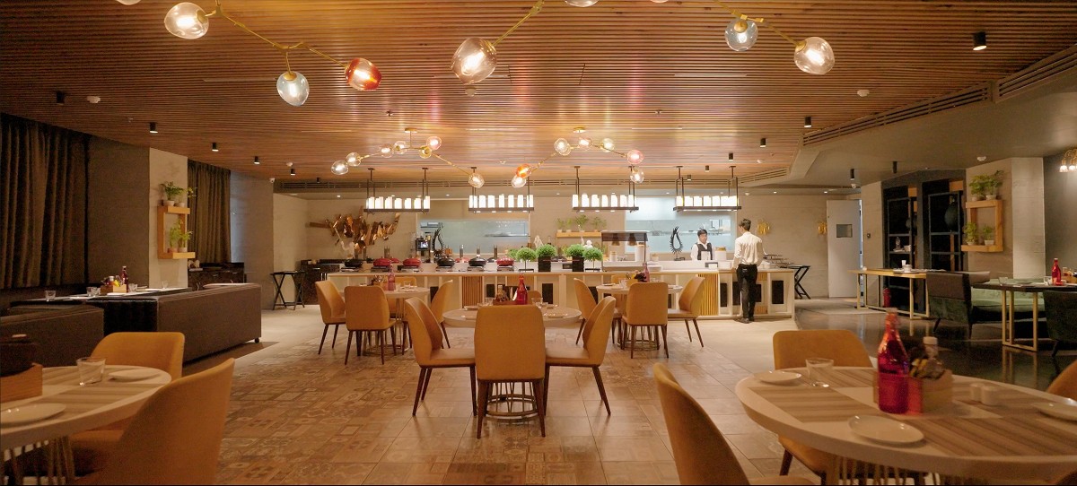 Udman banquet hall arranged with rows of tables for a gathering