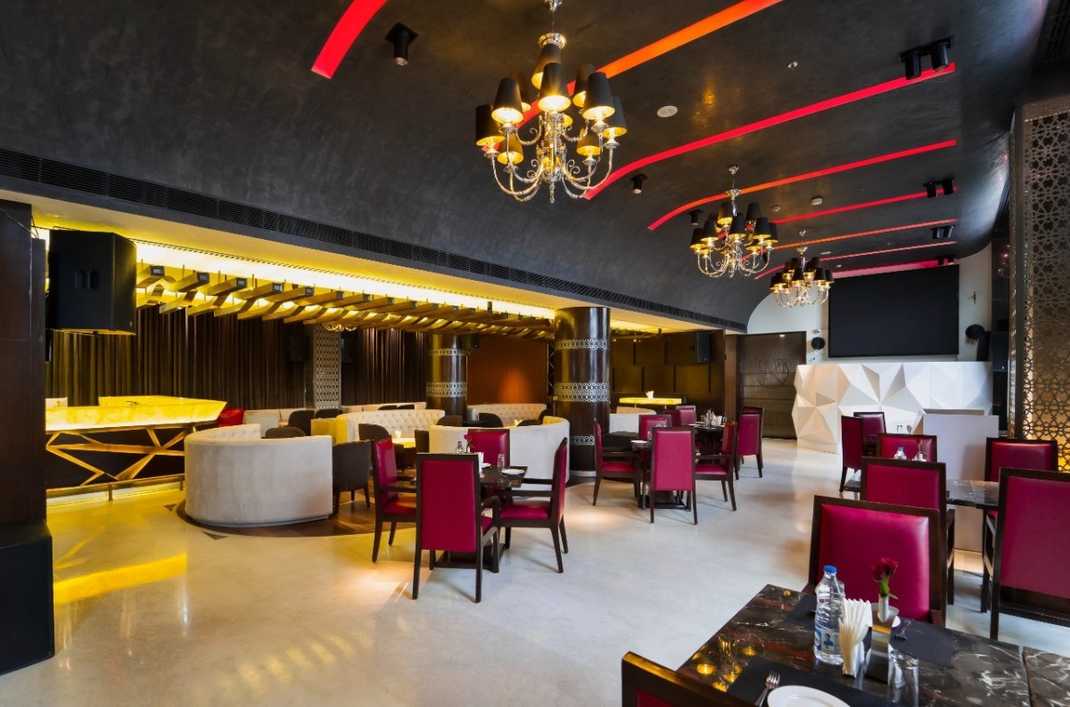 Udman Hotel event hall with warm lighting and stylish decor