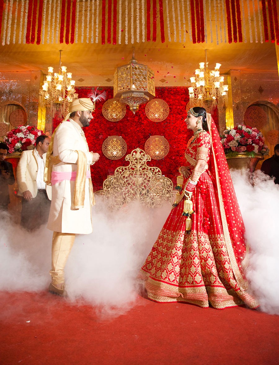 Ayushi and Shashwat in a portrait during their wedding festivities