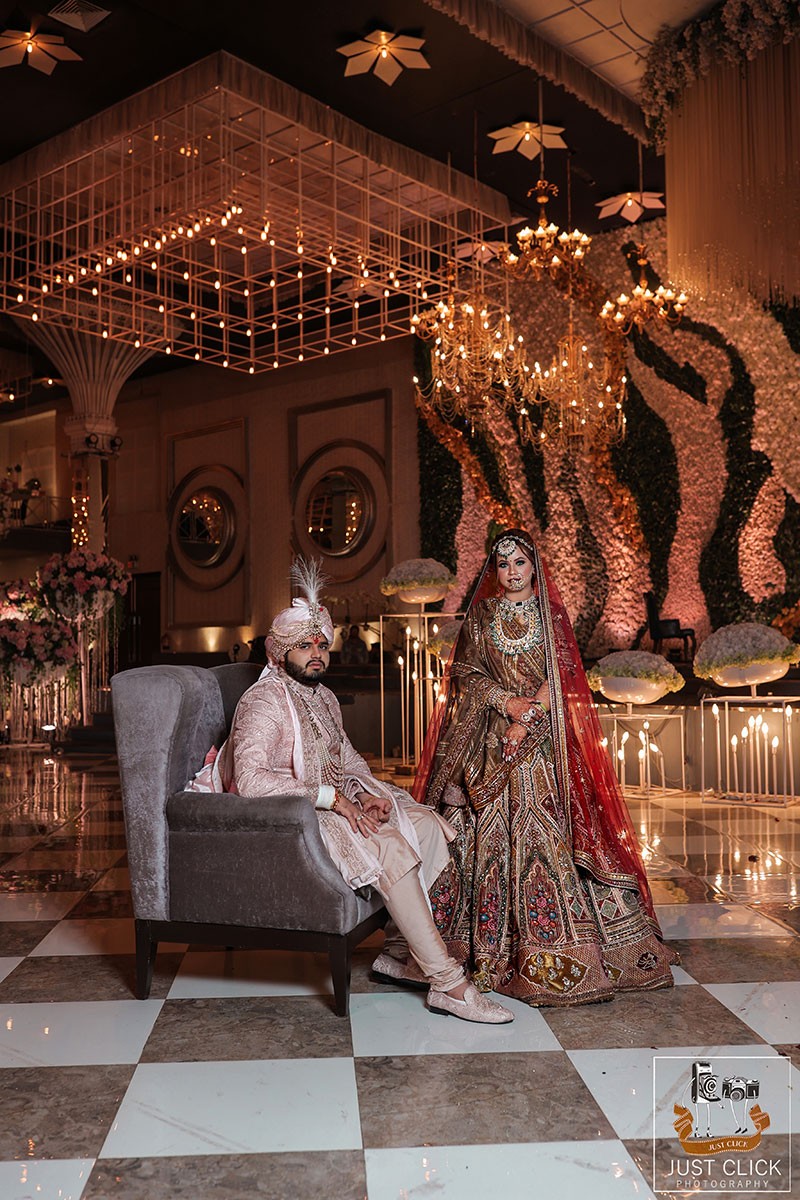 Close-up of bride and groom together near the decor