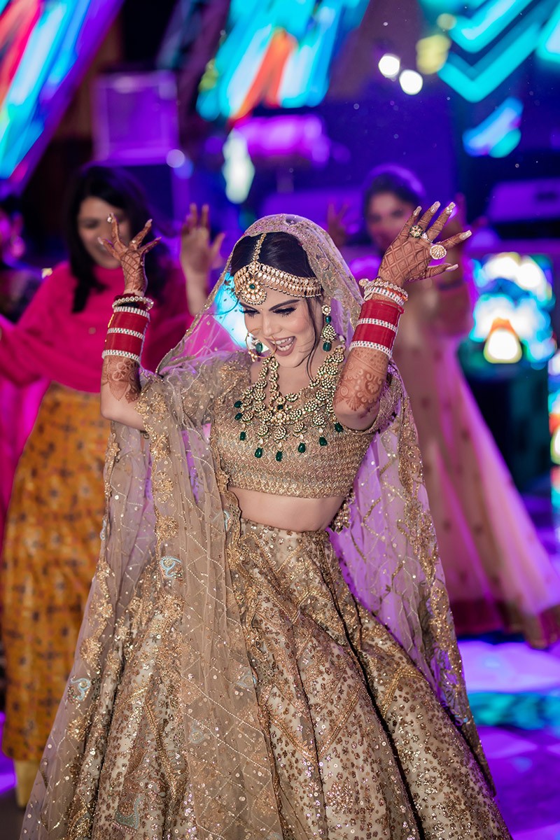 Portrait of bride Neha in an ornate lehenga