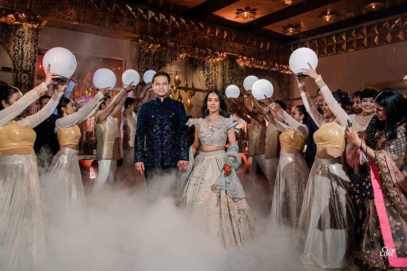 Family members walking together amid falling confetti