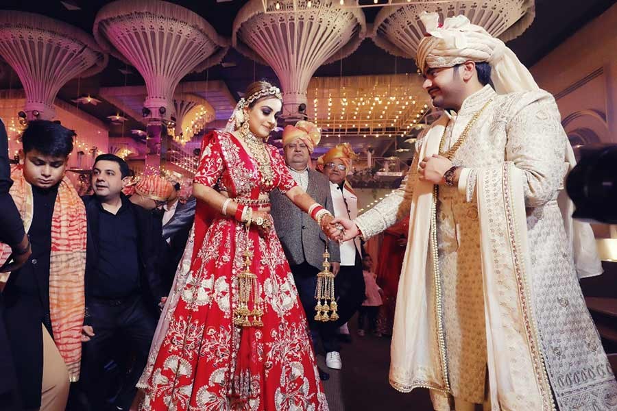 Saurabh and Gargi with guests during their wedding celebration