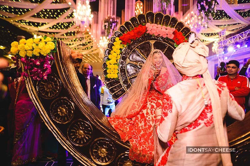 Close-up of bride in red bridal attire during the celebration