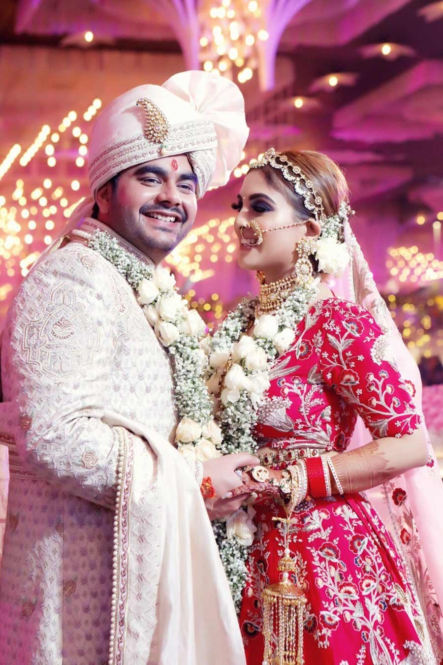 Saurabh and Gargi in traditional attire during their wedding celebration