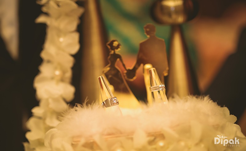 Warm-toned portrait of Ria and Manyu at their wedding