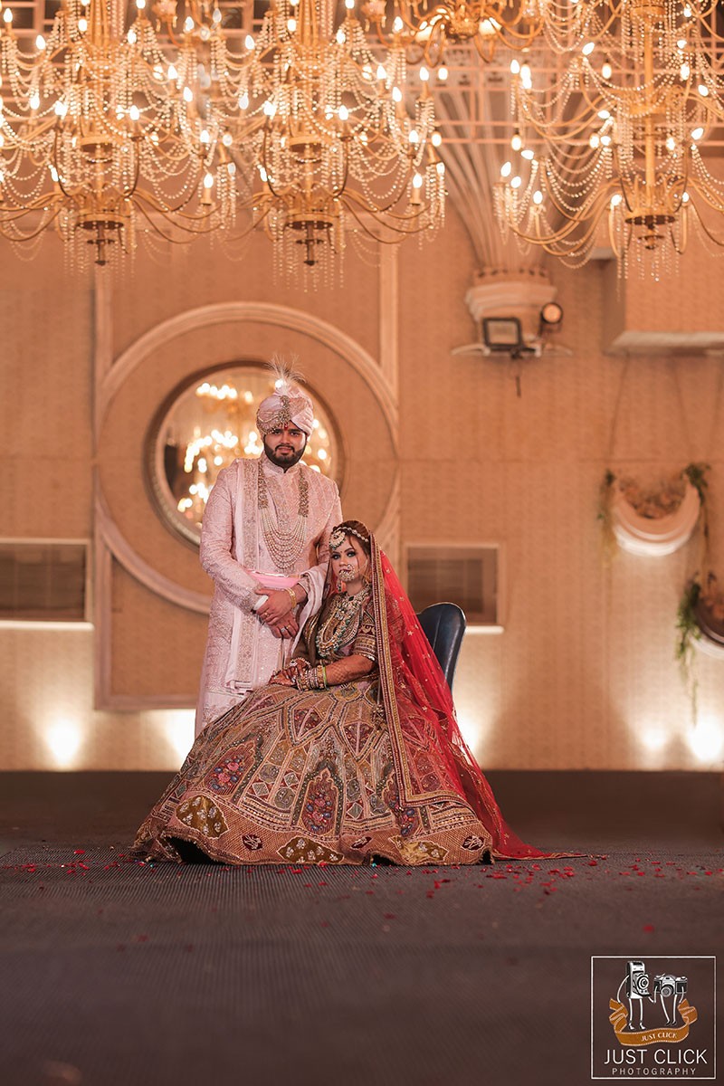 Close-up portrait of bride and groom together at the decorated venue