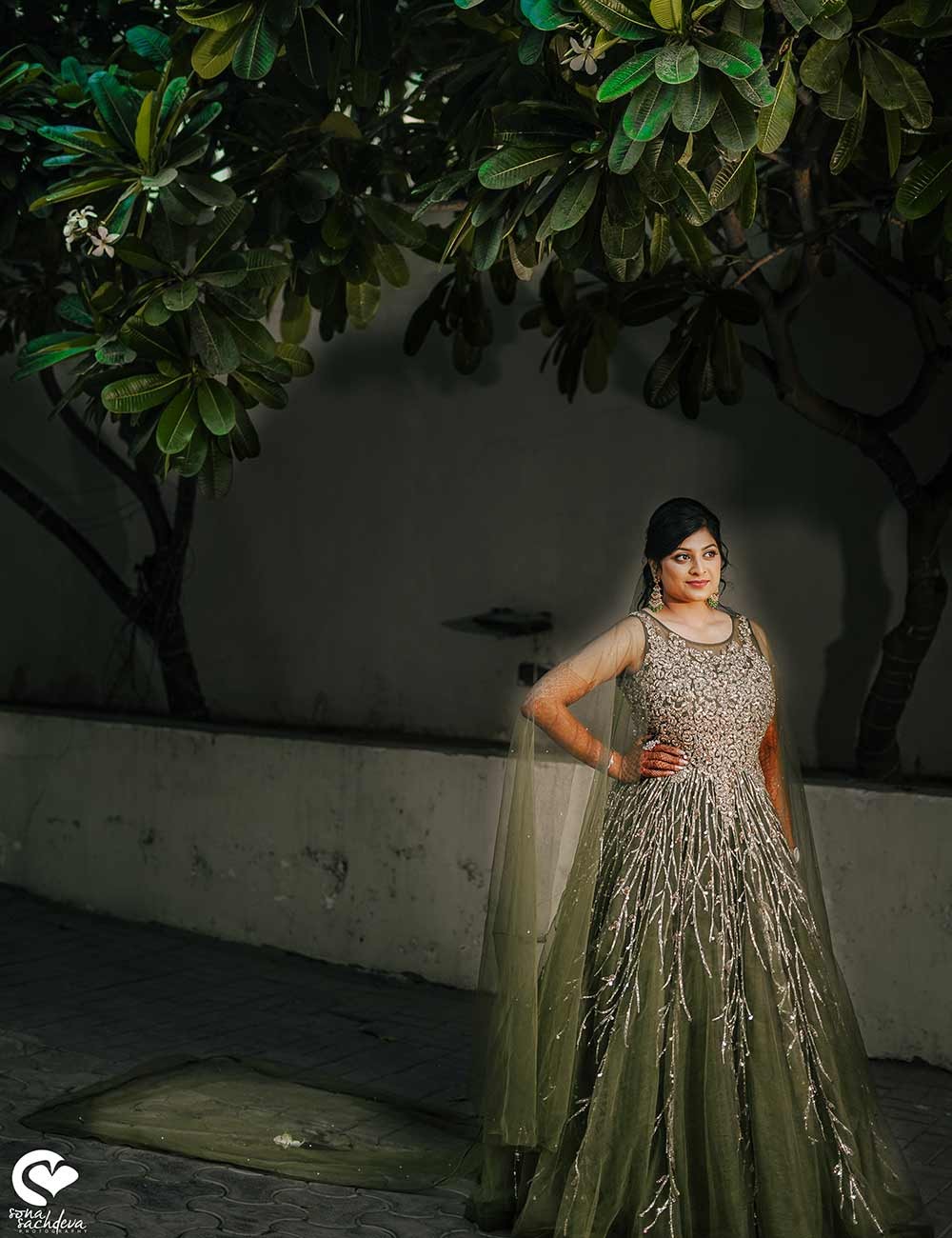 Deepanshu and Sonali sharing a quiet moment in a softly lit evening setting at their wedding