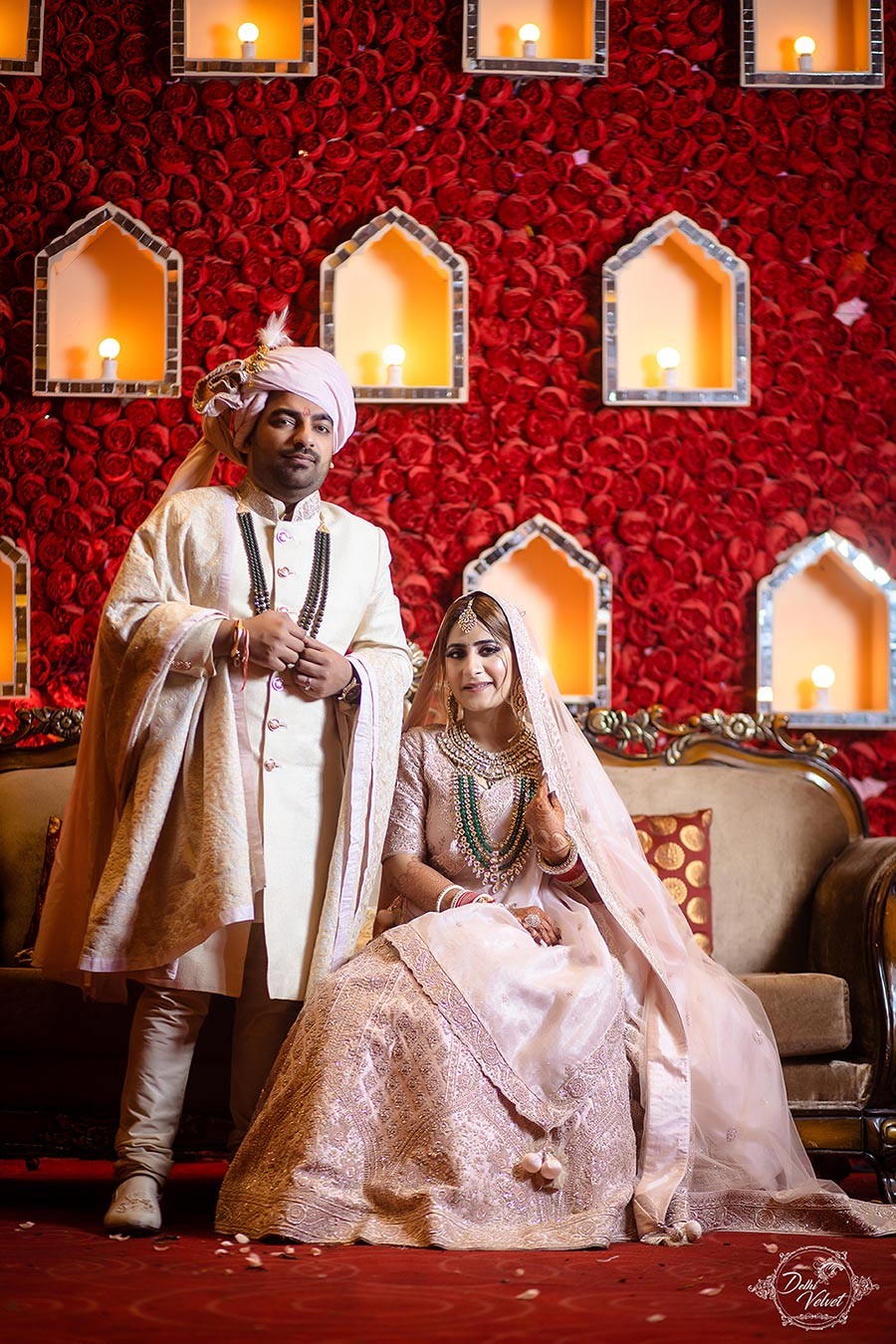Prakriti and Sahil in traditional attire during a wedding ritual