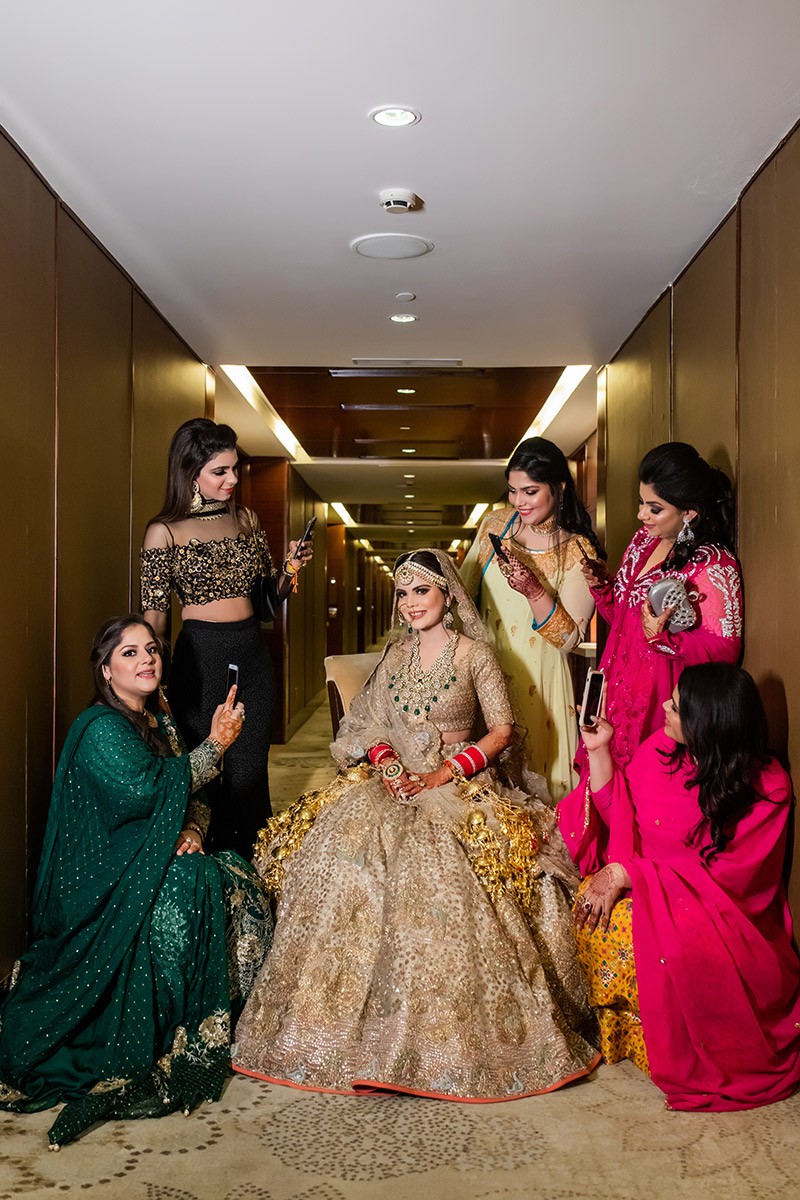 Neha and Pawan during their wedding ceremony amid warm decor