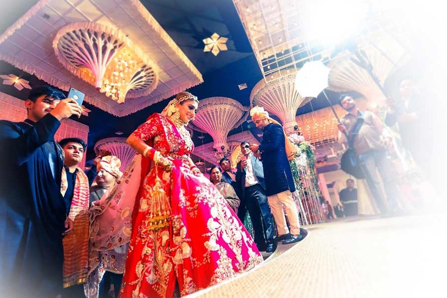 Saurabh and Gargi with family and guests during their wedding celebration