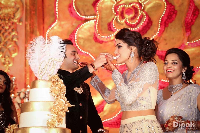 Shreejeet and Tanvi showered with confetti during their wedding celebration