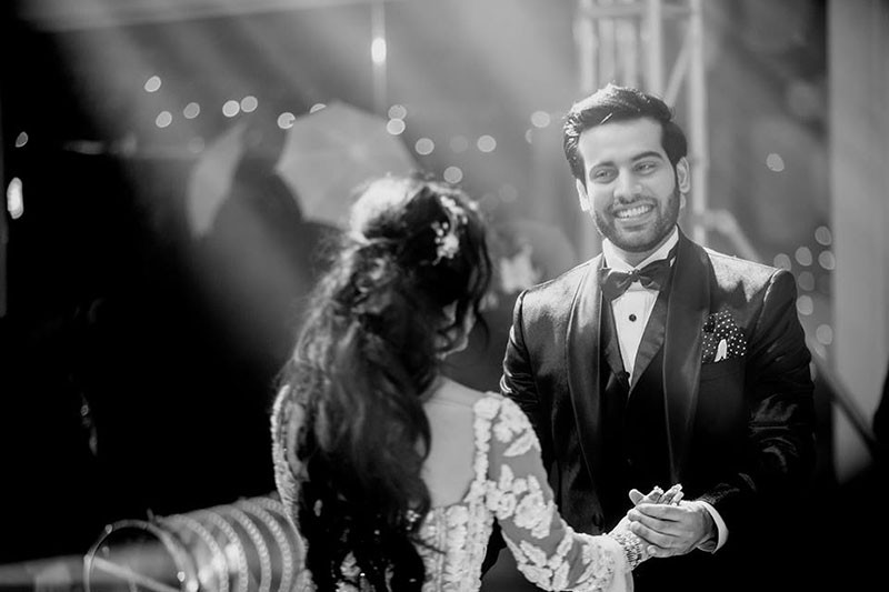 Neha and Pawan in a dramatic reception portrait