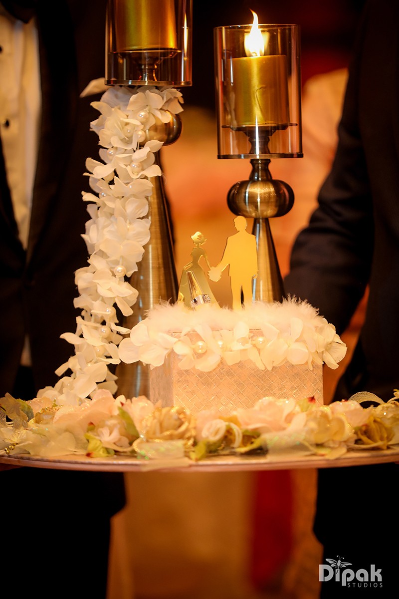 Elegant wedding cake and decor detail from Ria and Manyu's celebration