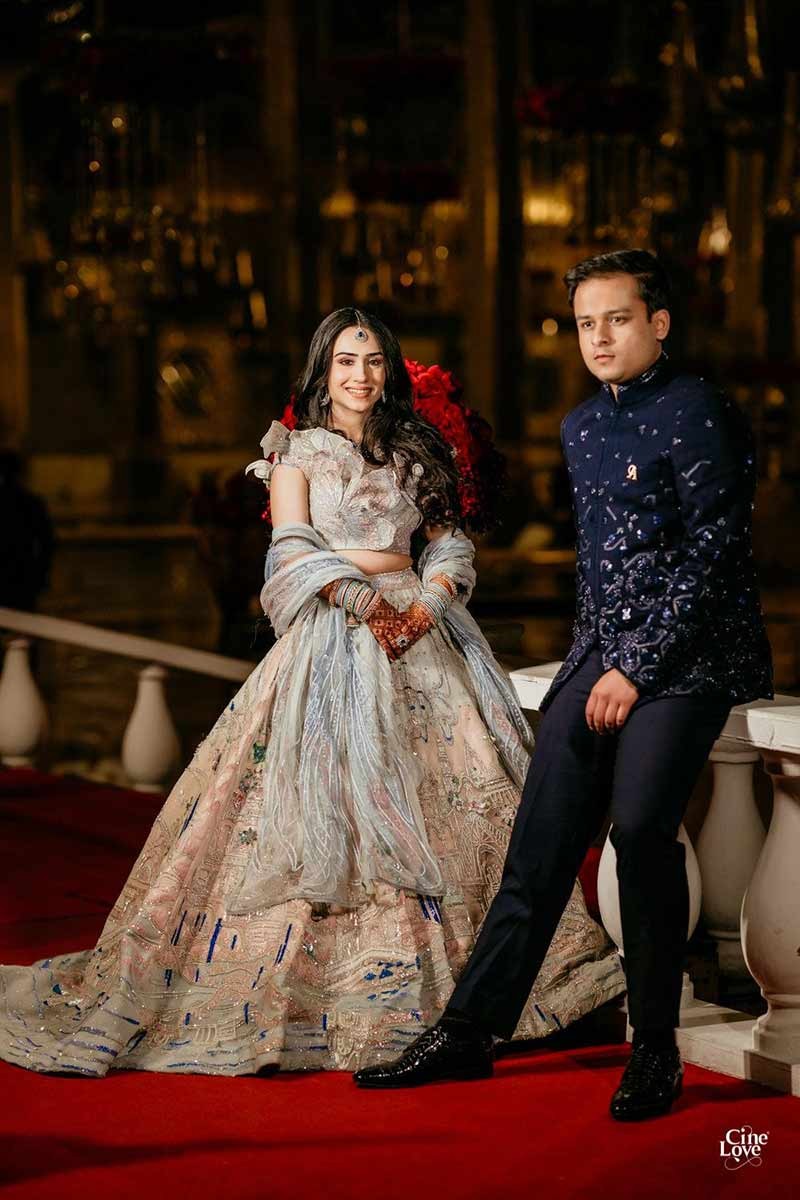 Close-up of bride and groom together in formal dark attire