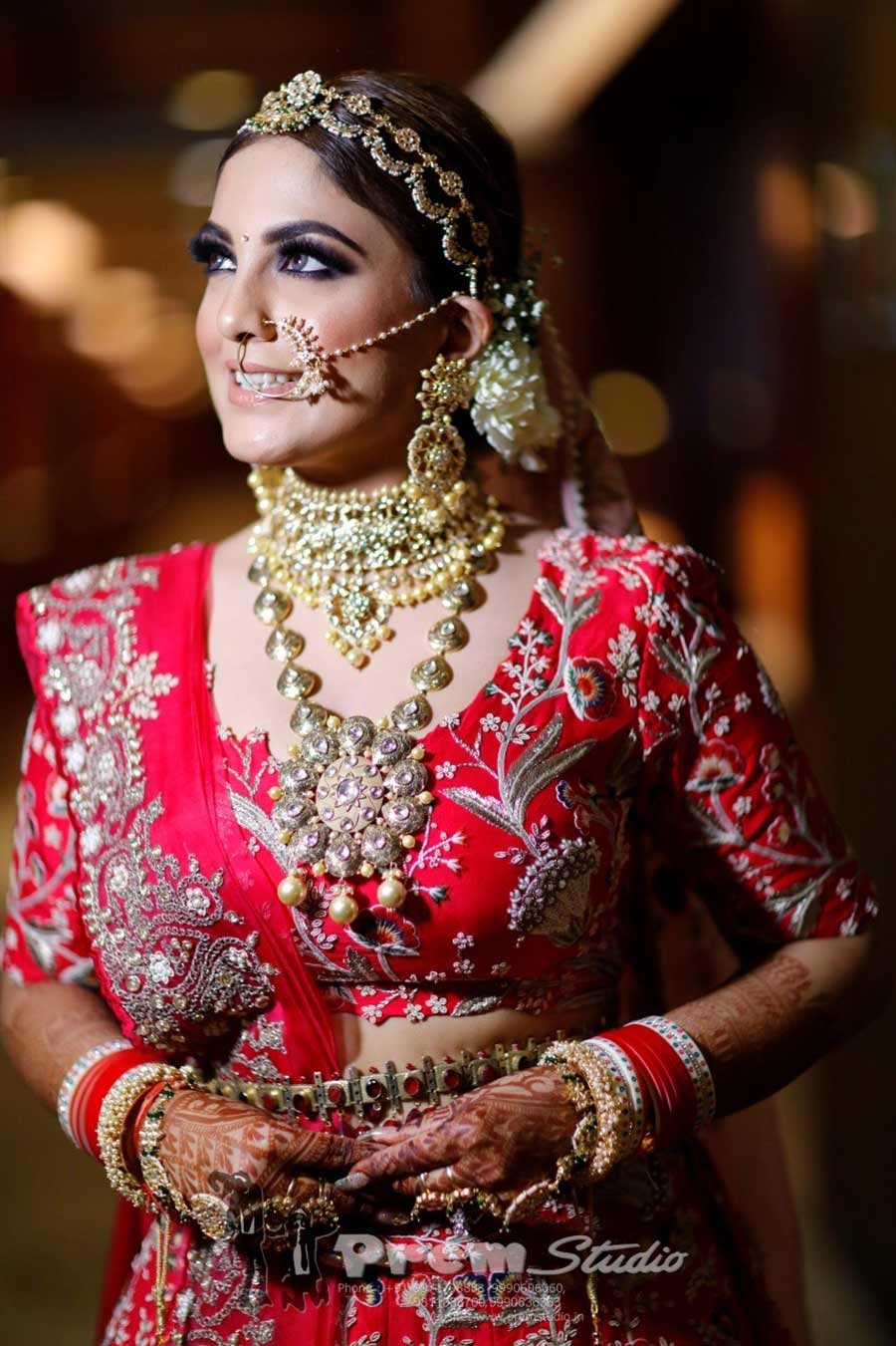 Portrait of bride Gargi in bridal finery during her wedding to Saurabh