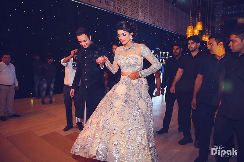 Shreejeet and Tanvi dancing together at their wedding reception