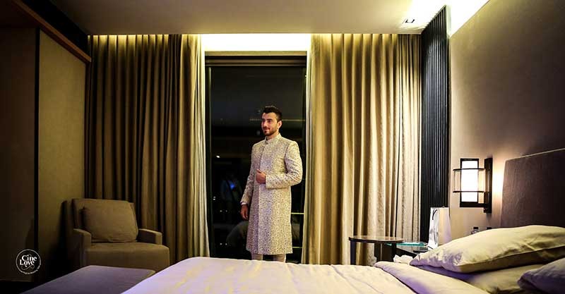 Groom Priyansh at a decorated entrance during his wedding