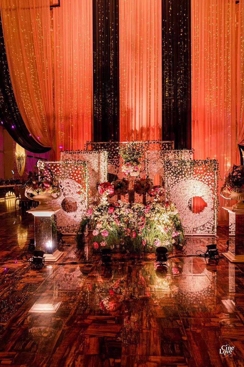 Wide view of the decorated dining area with orange lighting