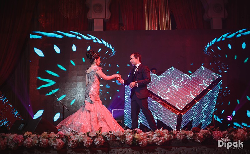 Ria and Manyu enjoying a colourful celebration at their wedding