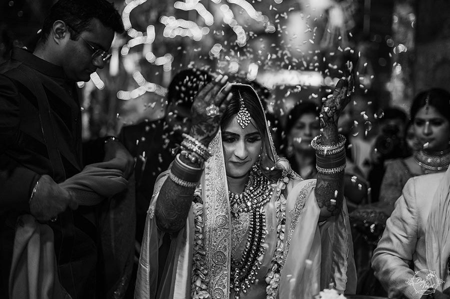 Black and white portrait of Prakriti and Sahil during their wedding celebration