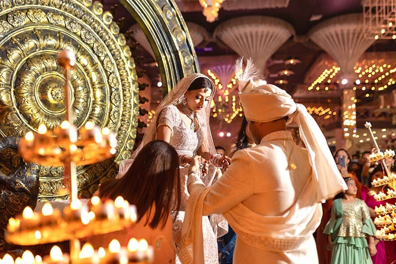 Groom arriving on a horse during the wedding procession