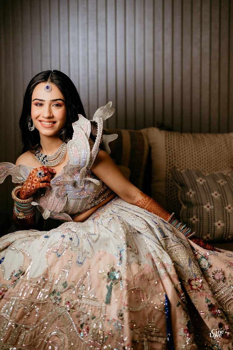 Close-up portrait of bride in a floral embellished gown