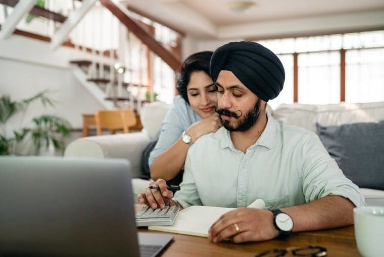 What is a subtle way to discuss the wedding budget when your families have different financial backgrounds?
