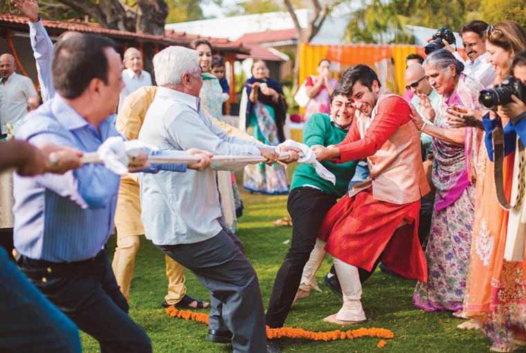 Tug of war at indian weddings